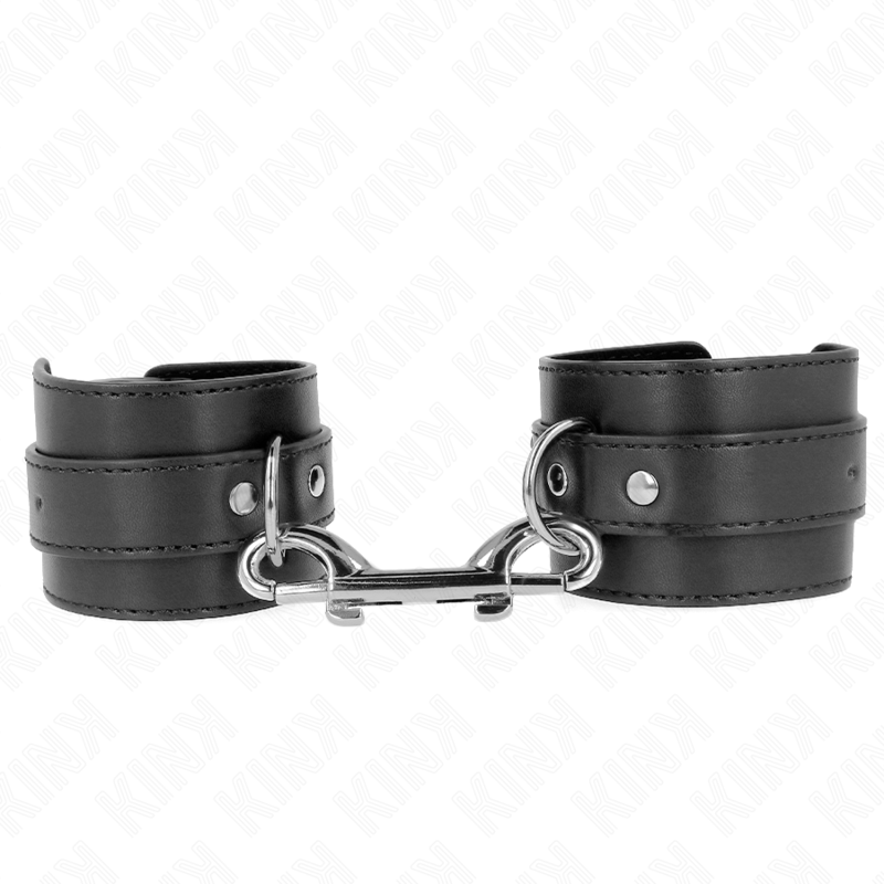 img_189525_65aeea7c02cfa20d8dffe591a1622e27_1.png KINK - HANDGELENKFESSELN - EINZELNE NIETENREIHE UND GROSSE SCHNALLE SCHWARZ VERSTELLBAR 17-28 CM X 5 CM